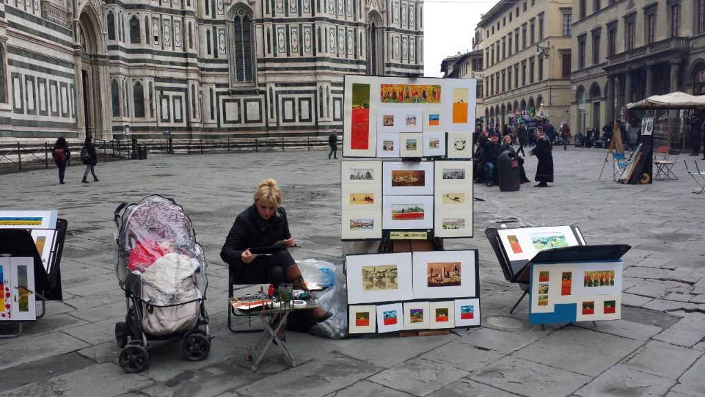 Artista de rua em  Florença, Agarre o Mundo. 