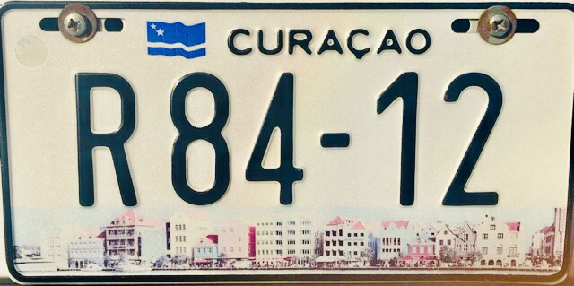 Placa do carro alugado em Curaçao, Agarre o Mundo